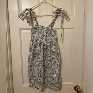 Pretty Little Things: White mini dress with black flowers, tie straps